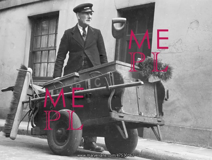 : Road sweeper with his cart : Road sweeper with his cart