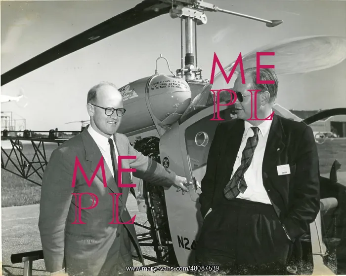 : Robert Herbert Whitby with Jack Caulson alongside Bell 47 : Robert Herbert Whitby with Jack Caulson alongside Bell 47