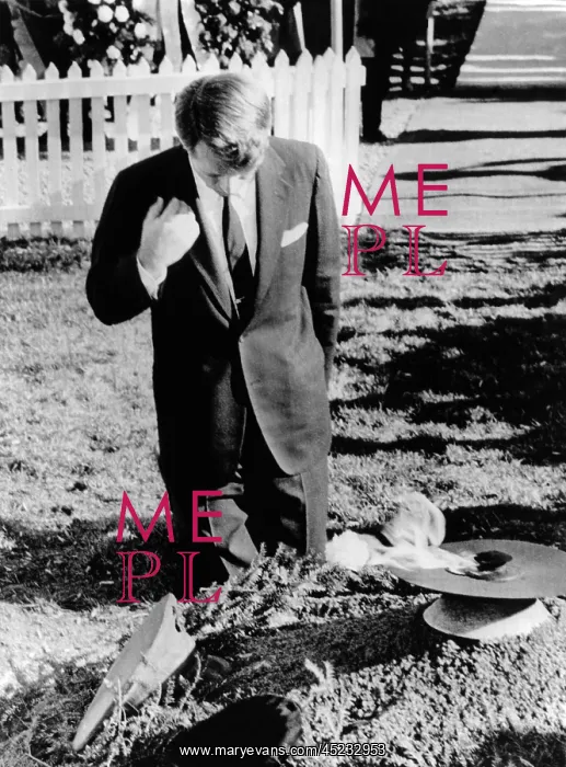 : Robert Kennedy prays at his brother's grave. ? : Robert Kennedy prays at his brother's grave. ?