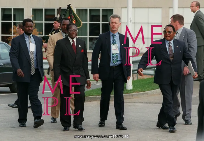 : Robert Mugabe Walks To Opening : Robert Mugabe Walks To Opening