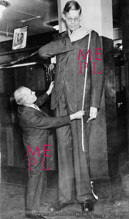 : Robert Wadlow with his tailor : Robert Wadlow with his tailor