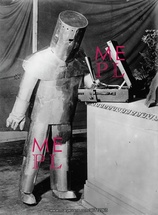 : A robot admiring a new record player : A robot admiring a new record player