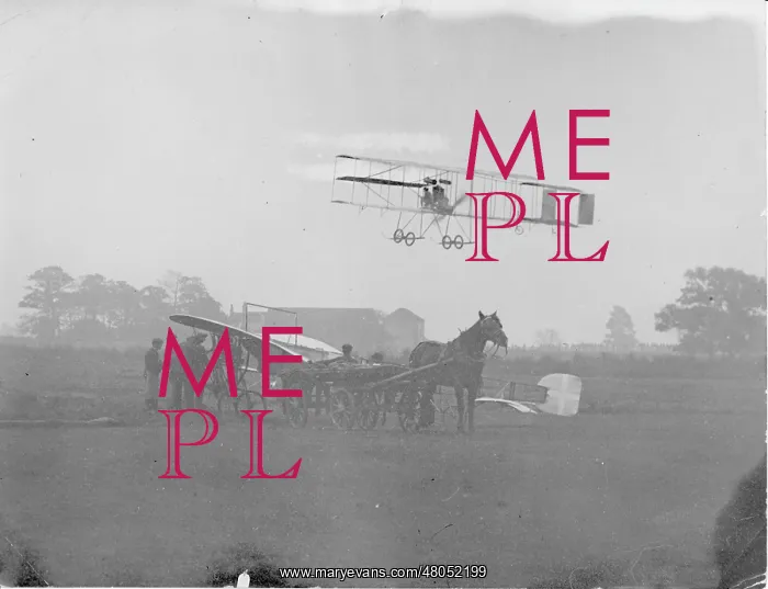 : Roger Sommer's Farman flying over Molon's Bleriot monoplane : Roger Sommer's Farman flying over Molon's Bleriot monoplane