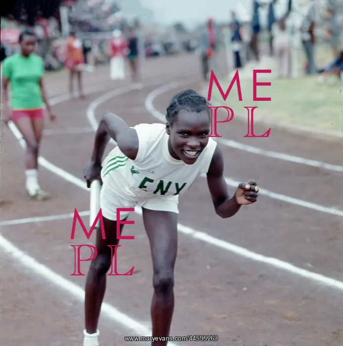 : Rosa Tata on the athletics track preparing to start a race : Rosa Tata on the athletics track preparing to start a race