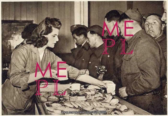 : Rosalind Cubitt serving tea at Euston YMCA canteen, WWII : Rosalind Cubitt serving tea at Euston YMCA canteen, WWII