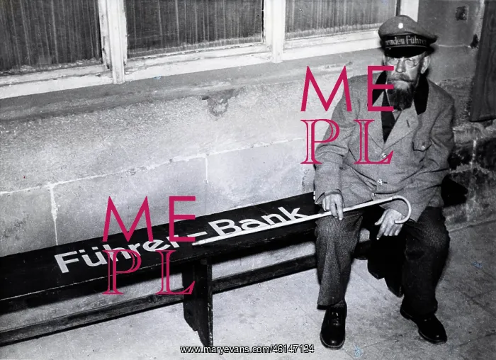 : Rothenburg Guide taking a rest on a bench between guidances : Rothenburg Guide taking a rest on a bench between guidances