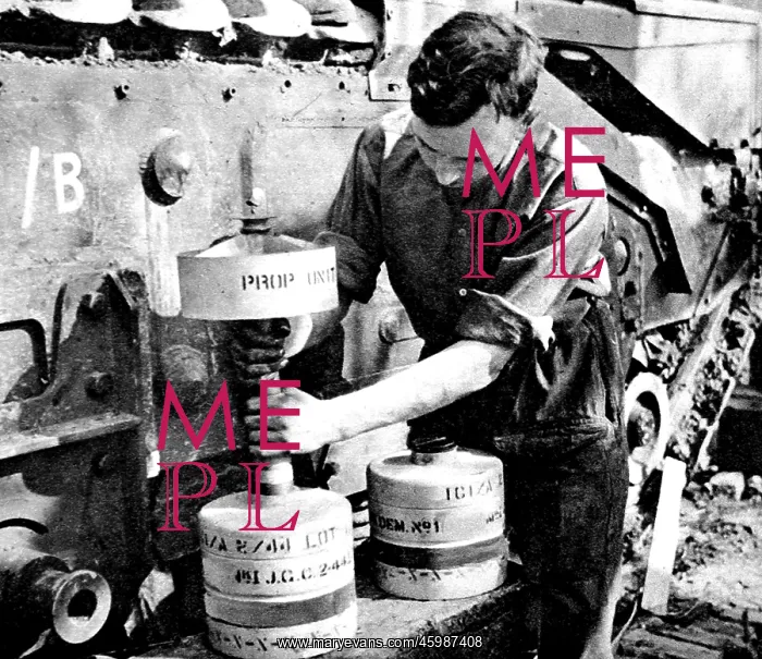 : Royal Engineer adjusting a Flying Dustbin charge : Royal Engineer adjusting a Flying Dustbin charge