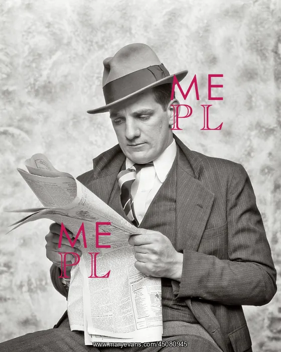 : Rumpled Businessman with grim expression reading paper : Rumpled Businessman with grim expression reading paper