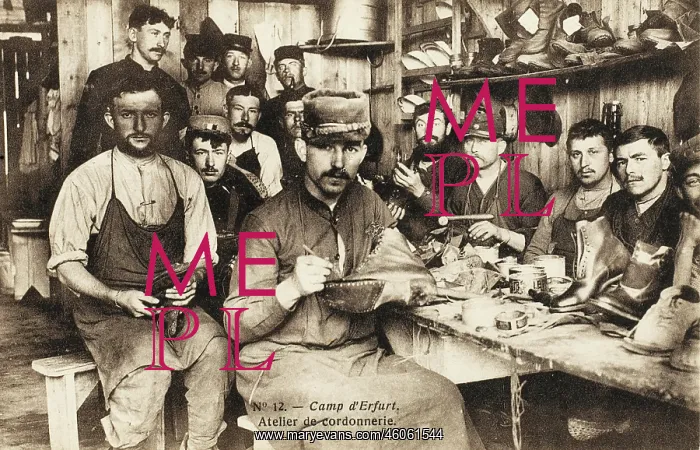 : Russian prisoners of war mending boots : Russian prisoners of war mending boots