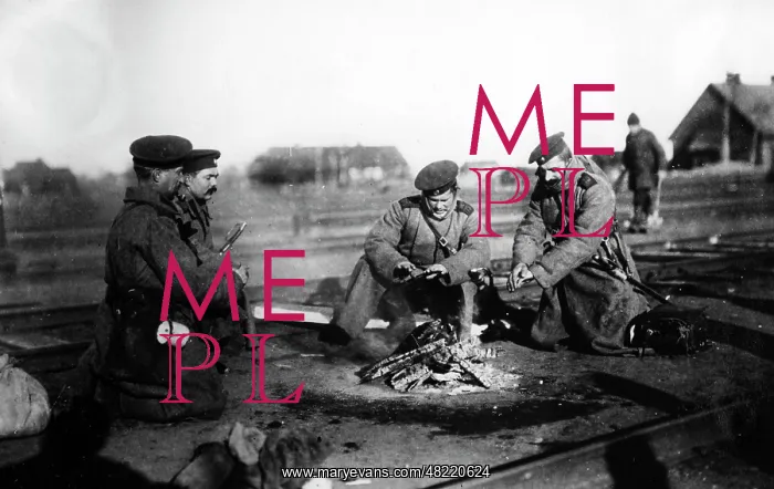 : Russian soldiers round a camp fire : Russian soldiers round a camp fire