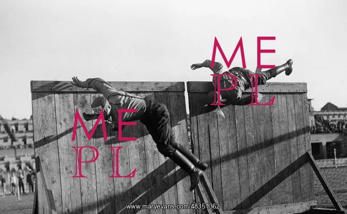 : SA men climb over a climbing wall, undated : SA men climb over a climbing wall, undated