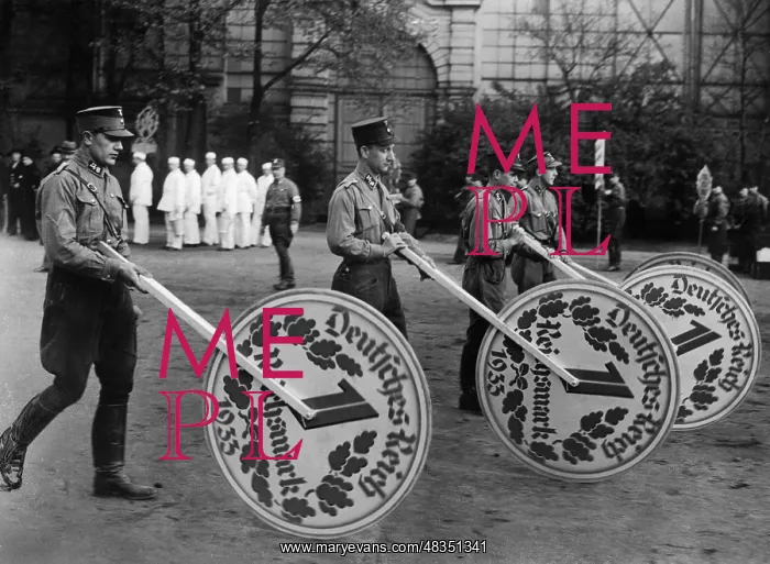 : SA men on a promotional march, 1933 : SA men on a promotional march, 1933