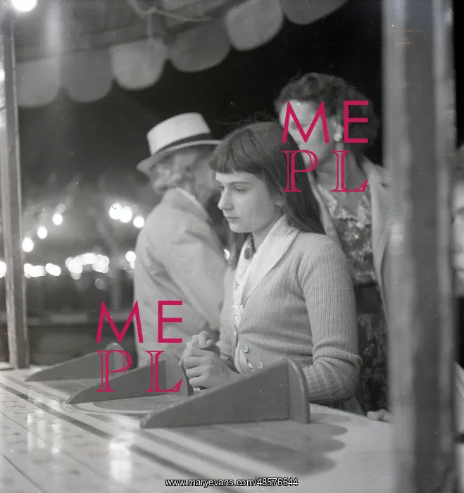 : Sad-looking girl at the fair : Sad-looking girl at the fair
