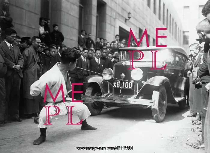 : Saiko Kojima pulls a car by his mouth-power : Saiko Kojima pulls a car by his mouth-power