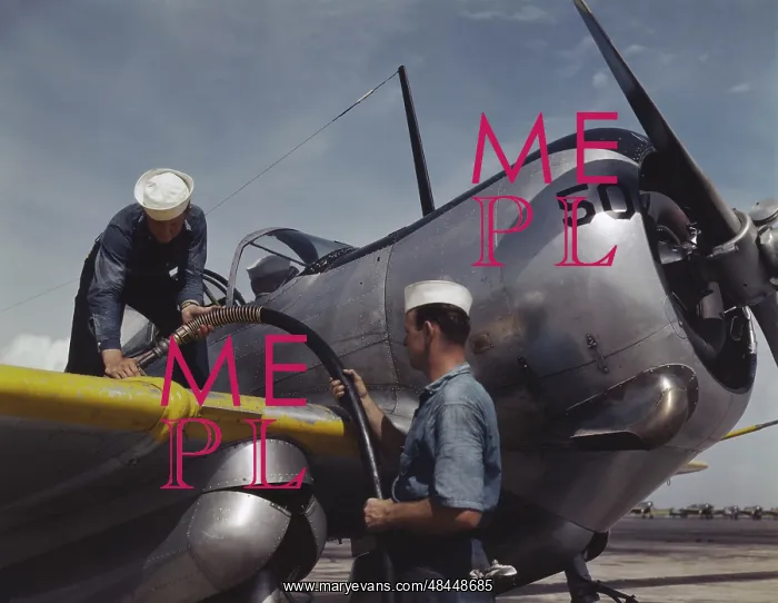 : Sailor mechanics refueling an SNC advanced : Sailor mechanics refueling an SNC advanced