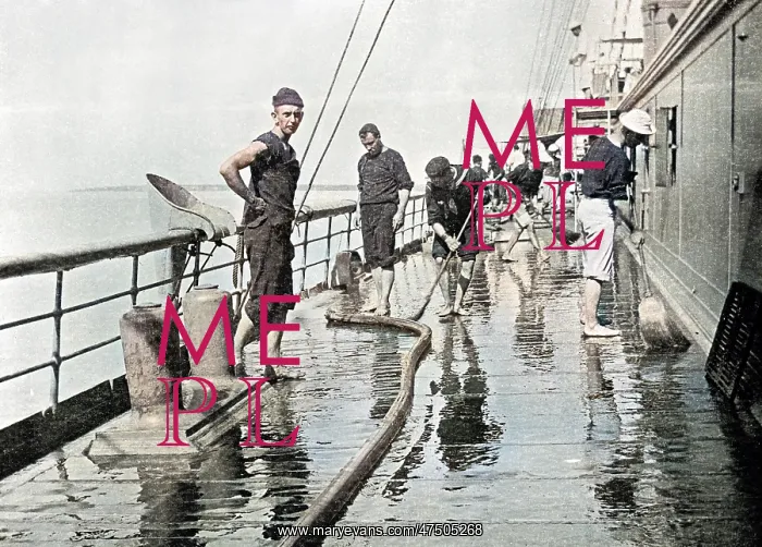  : Sailor washing down decks on the U.S.S. Yankee