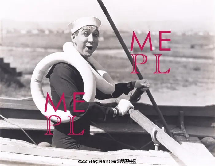 : Sailor wearing two life preservers : Sailor wearing two life preservers