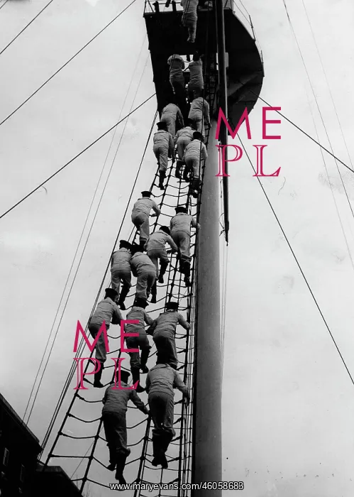 : Sailors are clambering the mast of the training ship. Photograph. 1936 : Sailors are clambering the mast of the training ship. Photograph. 1936