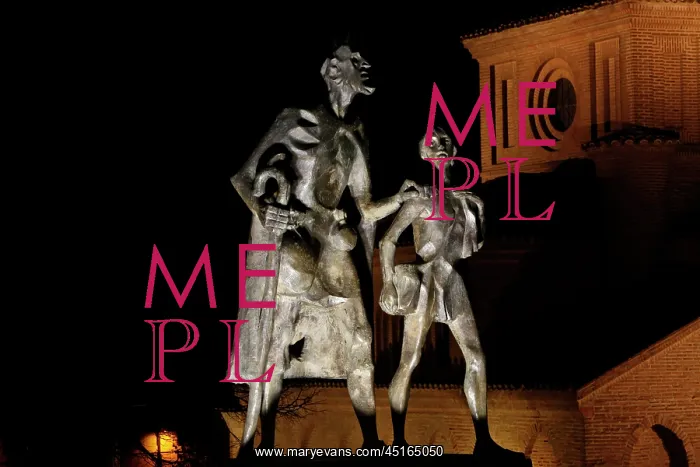 : Salamanca. Low angle view of statue of Lazarillo de Tormes leading the blind man : Salamanca. Low angle view of statue of Lazarillo de Tormes leading the blind man