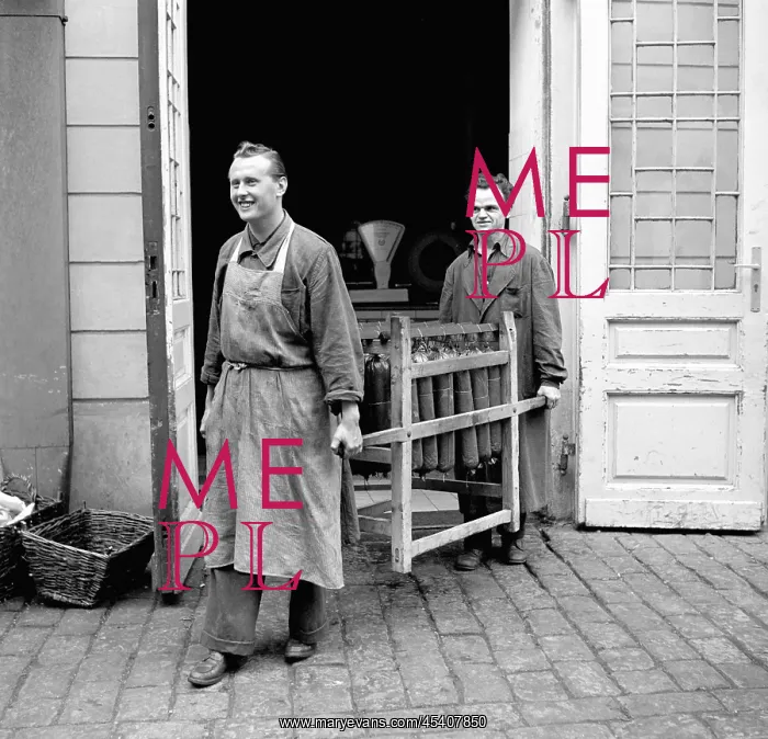  : Salami. Prague, 1949. Meat factory workers carry dozens of salamis. CTK Vinatge Photo