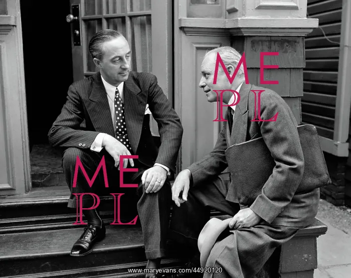 : Salesman and home owner man sitting together : Salesman and home owner man sitting together
