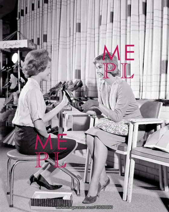 : Saleswoman Sitting on Stool Helping Customer Select : Saleswoman Sitting on Stool Helping Customer Select