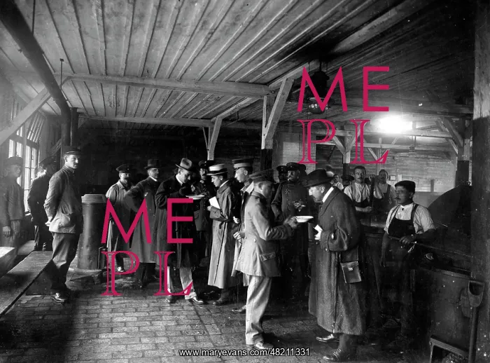 : Sampling the food at a prisoner of war camp, 1916 : Sampling the food at a prisoner of war camp, 1916