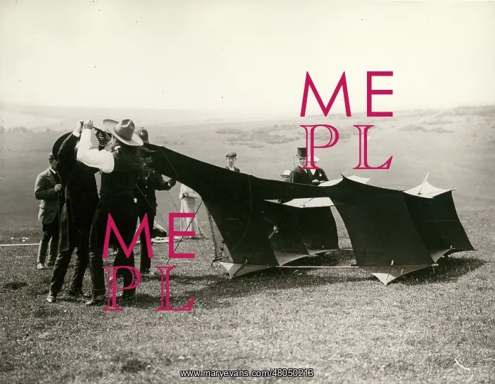 : Samuel Cody adjusts his kite : Samuel Cody adjusts his kite
