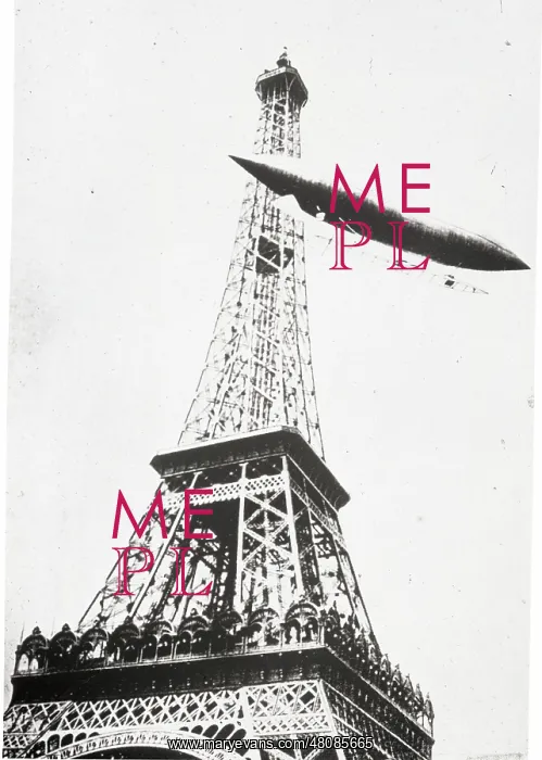 : Santos-Dumont airship No6 rounding the Eiffel Tower in t : Santos-Dumont airship No6 rounding the Eiffel Tower in t