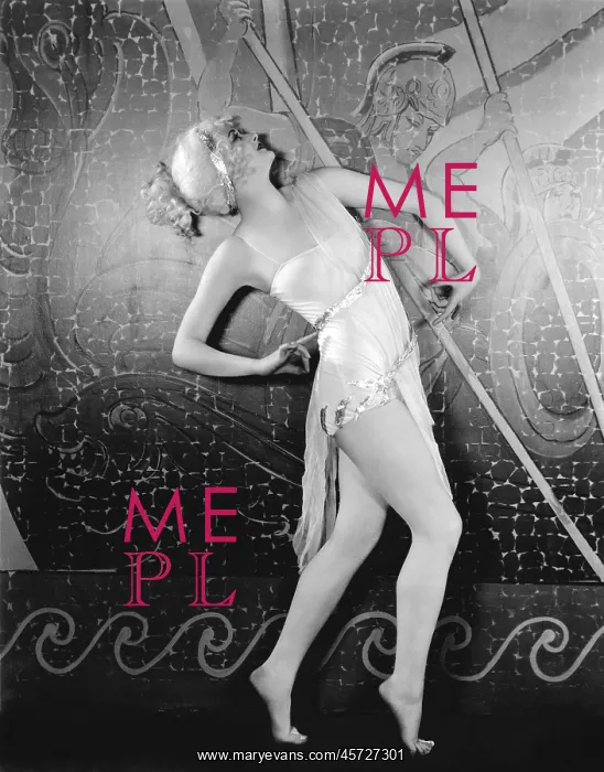  : Scantily clad performer posing in front of mural