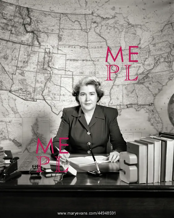 : School Geography Teacher Sitting at Desk Looking : School Geography Teacher Sitting at Desk Looking