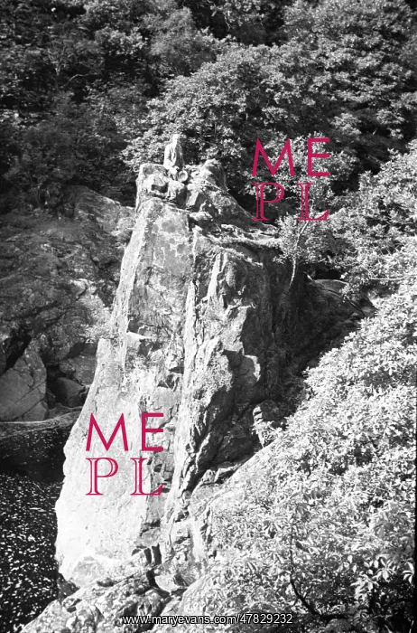 : Scottish gentleman resting on a rock, over a mountain beck : Scottish gentleman resting on a rock, over a mountain beck