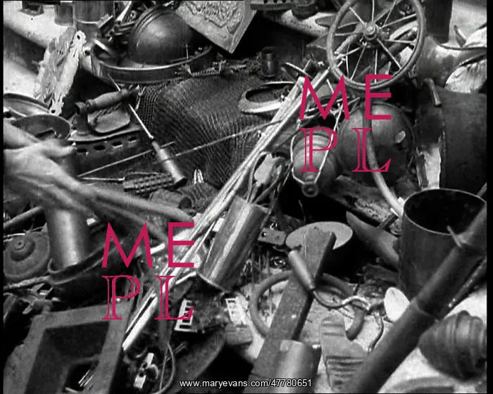 : Scrap Metal Being Thrown into a Pile : Scrap Metal Being Thrown into a Pile