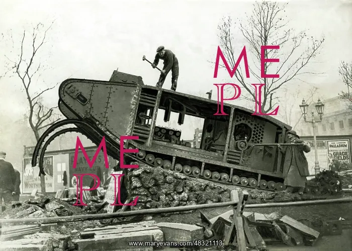: Scrapping of a German tank in England, 1919 : Scrapping of a German tank in England, 1919