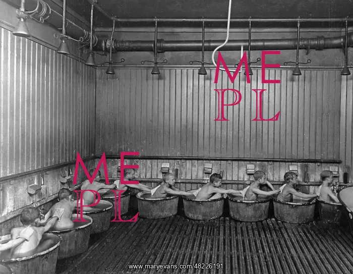 : Scrubbing backs in the bath of the school, 1903 : Scrubbing backs in the bath of the school, 1903