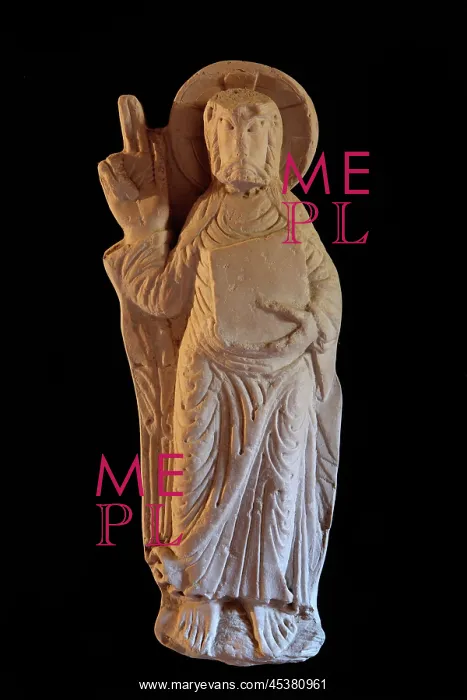 : Sculpted figure of Christ holding a book and making : Sculpted figure of Christ holding a book and making