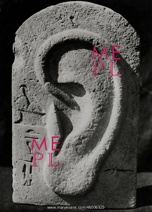 : Sculpture of huge ear with hieroglyphics : Sculpture of huge ear with hieroglyphics