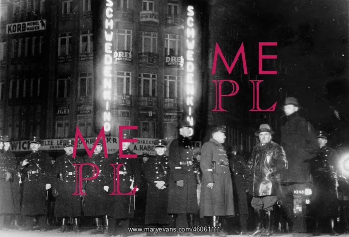 : Security agents in front of a cinema : Security agents in front of a cinema
