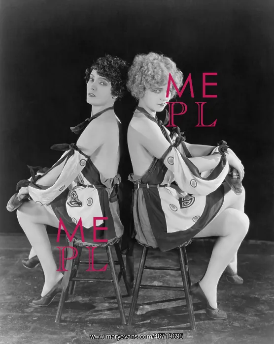 : Two seductive women back to back : Two seductive women back to back