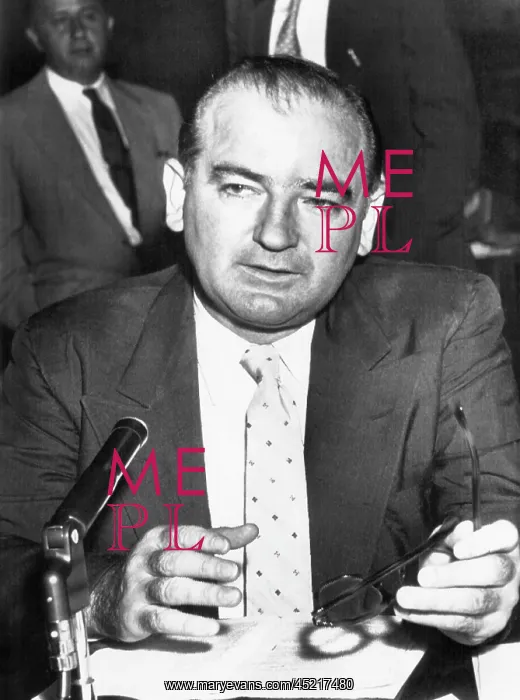 : Senator Joseph McCarthy sits at the witness ? : Senator Joseph McCarthy sits at the witness ?