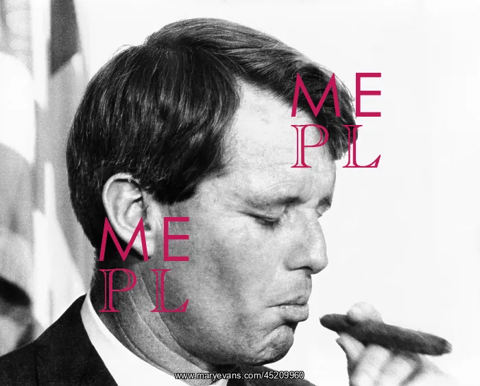 : Senator Robert Kennedy eyes a cigar. He ? : Senator Robert Kennedy eyes a cigar. He ?