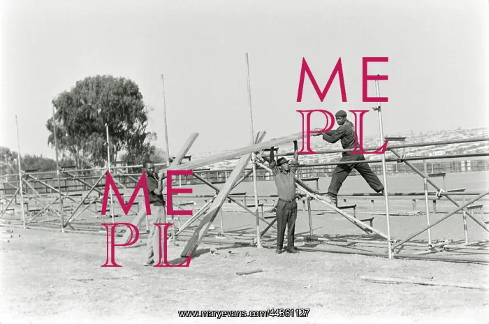 : September 26 1965 - Workmen putting up; the stands : September 26 1965 - Workmen putting up; the stands