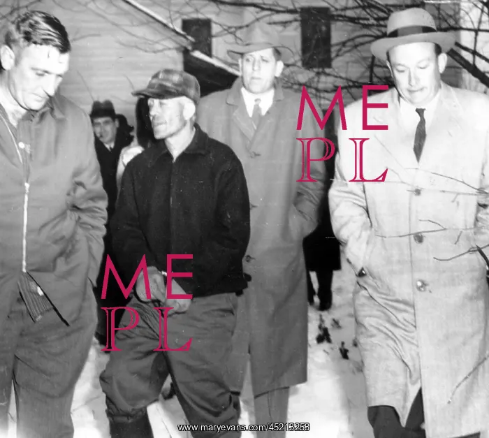 : Serial Killer Ed Gein is led away from his ? : Serial Killer Ed Gein is led away from his ?