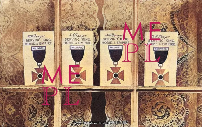 : Service cards in a window in Arundel, WW1 : Service cards in a window in Arundel, WW1