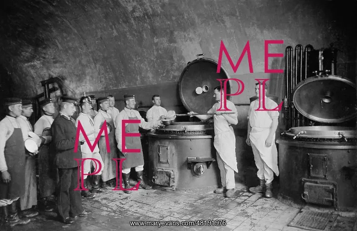 : Serving a meal in a German barracks, 1906 : Serving a meal in a German barracks, 1906