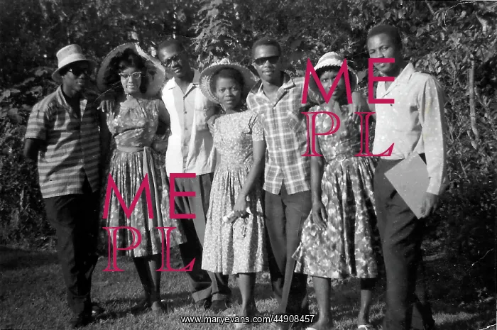 : Seven black British Caribbean and African students having a : Seven black British Caribbean and African students having a