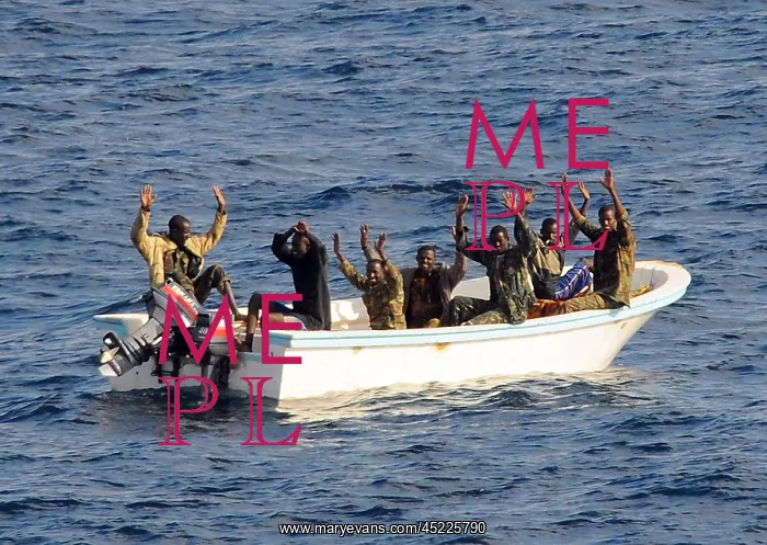 : Seven suspected pirates with hands raised ? : Seven suspected pirates with hands raised ?