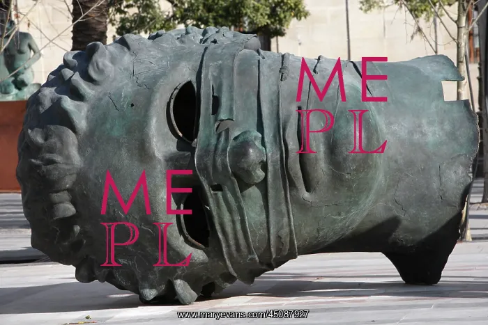 : Seville. Low angle view of sculpture, Eros Bendato : Seville. Low angle view of sculpture, Eros Bendato