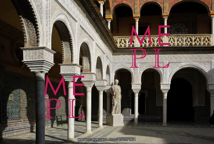 : Seville. Low angle view of the Central Patio with a Roman statue of Minerva : Seville. Low angle view of the Central Patio with a Roman statue of Minerva