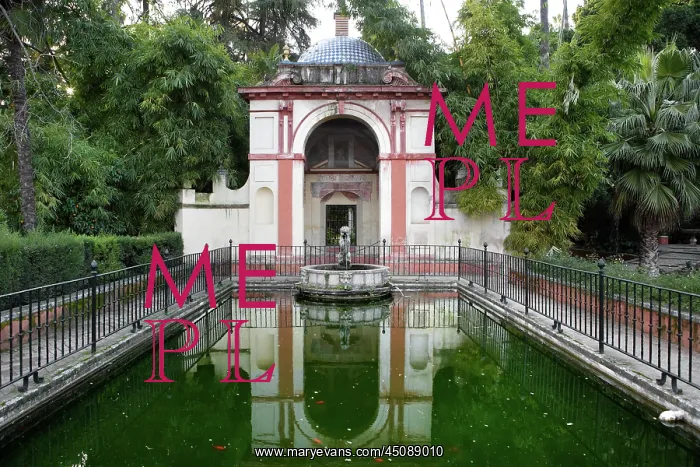 : Seville. Low angle view of pool, Gardens, Real Alcazar : Seville. Low angle view of pool, Gardens, Real Alcazar